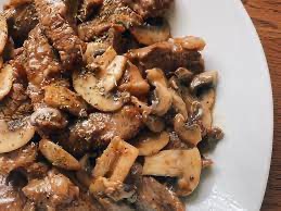 Ternera con champiñones